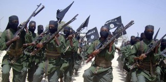 2011 Al-Shabab fighters march with their guns during military exercises on the outskirts of Mogadishu, Somalia. Source: AP