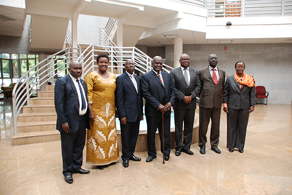 Backbench Commissioner with the Speaker Parliament of Zambia (third right) and Clerk of the Assembly (extreme right)