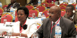 The Attorney General, Hon. Freddie Ruhindi (L)