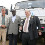 The WFP acting Country Director Michael Dunford (l), the Uganda Cabinet Minister of State for Relief and Disaster Preparedness,