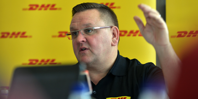 DHL Expres Sub-Saharan Africa MD Charles Brewer at a press conference