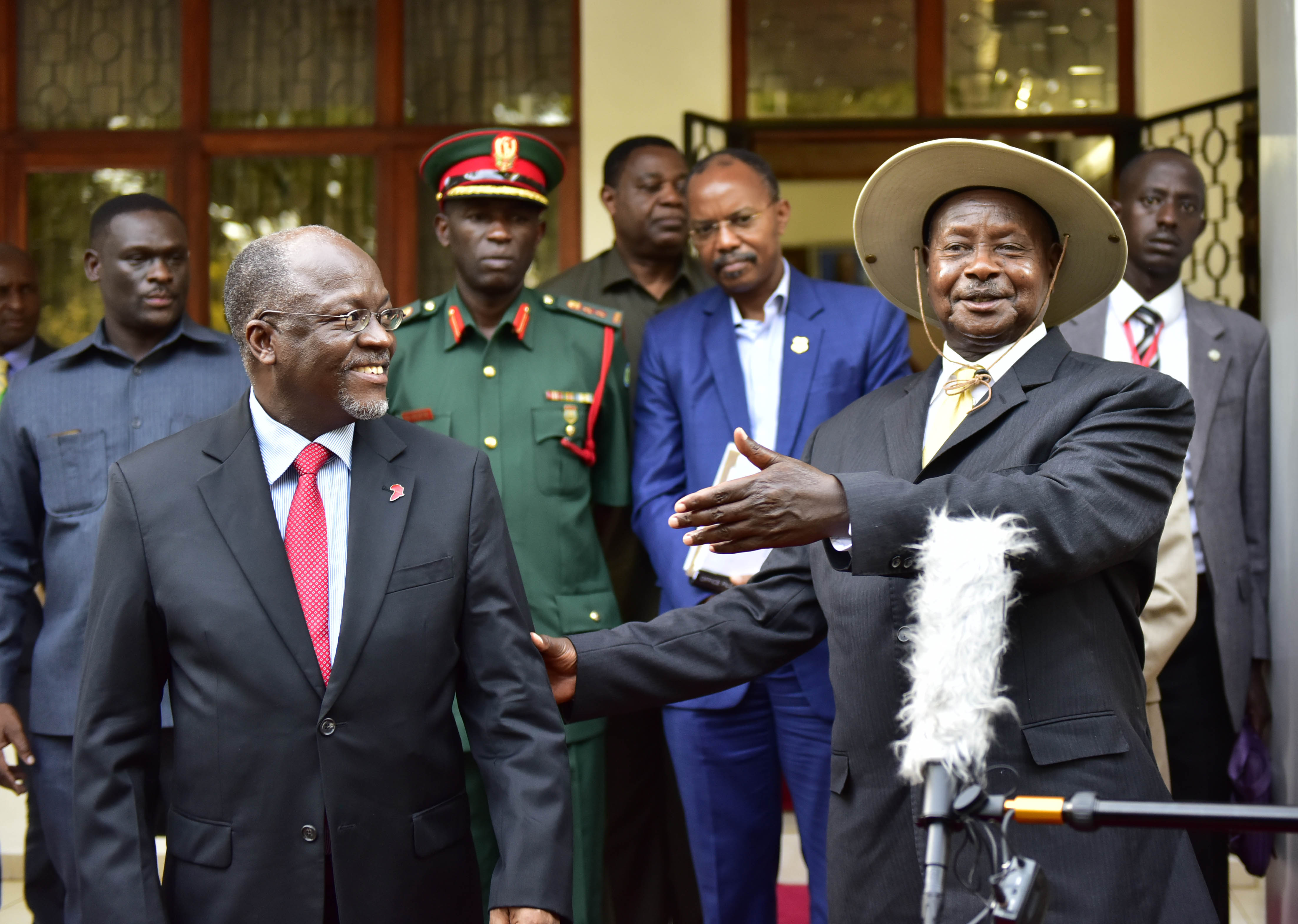 The President Yoweri Kaguta Museveni interacts with Tanzanian President John Pombe Magufuli shortly after the bilateral meeting at the Arusha state lodge in Tanzania on Tuesday 30th February 2016. President Museveni together with the East African Heads of State are meeting in Arusha for the 17th Ordinary Summit.