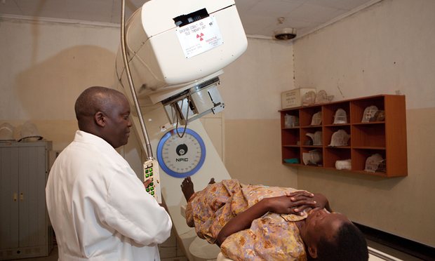 A patient undergoes treatment for cervical cancer at Mulago hospital in Kampala. The radiation therapy machine – for the past five years the only one in Uganda – may now be irreparable.