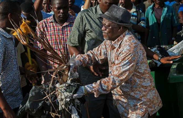 Mr Magufuli spent Independence Day picking up rubbish in Dar es Salaam
