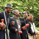 Don Kanta (L) performing with the Afrigo band in 2011. Next to him is Abbey Katongole, Rud Boy Devoe and Herman Sewanyana