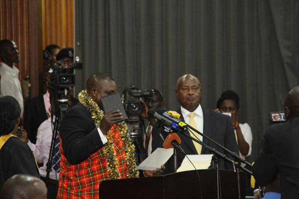 President Museveni looks on after as Jacob Oulanyah swears in as Deputy Speaker of the 10th Parliament on Thursday