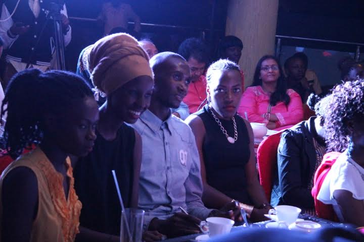 Top model manager Ronnie Nsubuga and female colleagues enjoy the auditions at Dinners Restaurant, Ham Towers outside Makerere University.