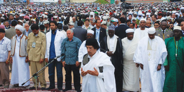 Col Muammar Gadaffi leads Muslims in prayers to mark Prophet Muhammad’s birthday at Nakivubo stadium on May 18, 2008 