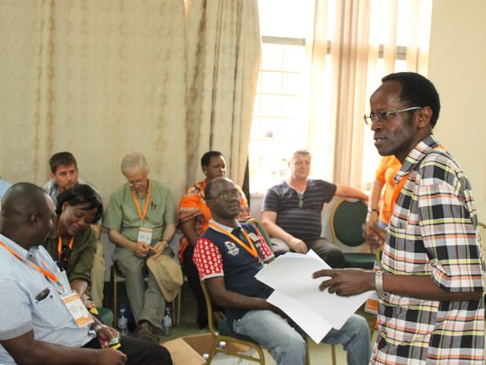 Robert Mwanga speaks in a mentoring workshop