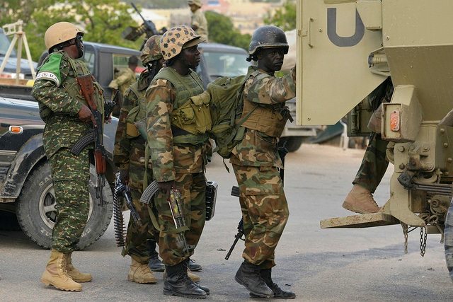 Image result for uganda soldiers guns