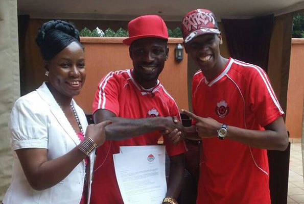 Express chairperson Florence Nakiwala Kiyingi with club brand ambassador Bobi Wine and CEO Ahmed Rama Hadji recently.