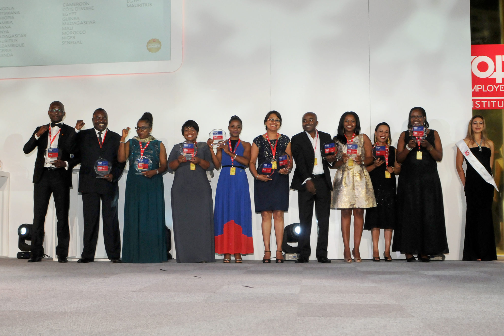 DHL Express Sub Saharan Africa Human Resources Representatives receiving their Top Employer 2017 certification. DHL Express received Top Employer 201 certification in 12 African countries. They were also certified as a Top Employer for Africa 2017