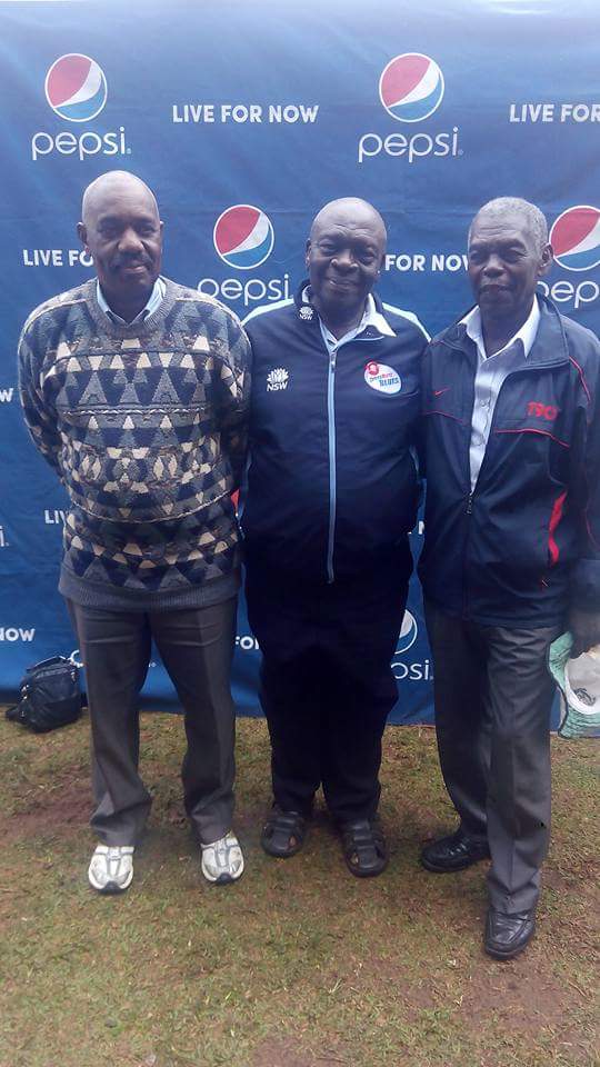 FRIENDLY: The late Ligyalingi poses for a photo with fellow sports enthusiasts including Cricket legend Sam Walusimbi.