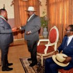 THE MAYOR OF MONGOMO HANDS A KEY TO PRESIDENT M7 AT THE CITY HALL IN MONGOMO
