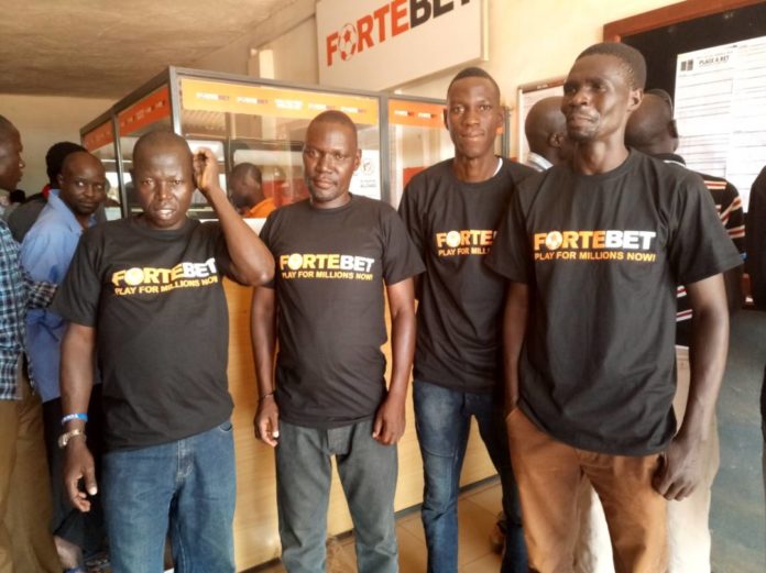 The T-shirts winners at Lira branch
