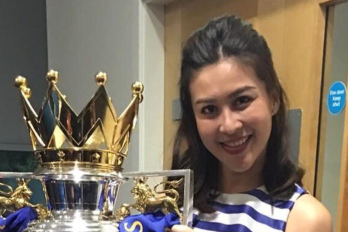 Nusara Suknamai poses with trophy that Leicester City won in 2015-16 season