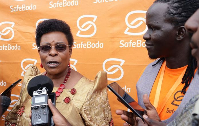 Kamapala minister Beti Kamya with Safe Boda CEO