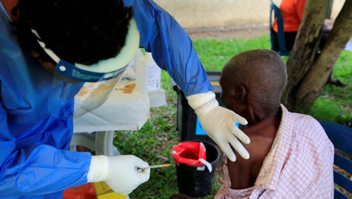 Ebola vaccine to a man