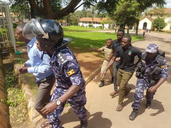 Police force Makerere students to stay in lecture rooms