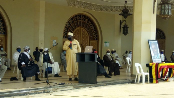 A representative of the family addressing the mourners.