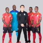 The home kit (L-R) Shafik Kagimu, Charles Lukwago, Paul Willa and Brian Aheebwa. In the Middle is Head coach Johnathan McKinstry wearing the Technical Officials’ kit.