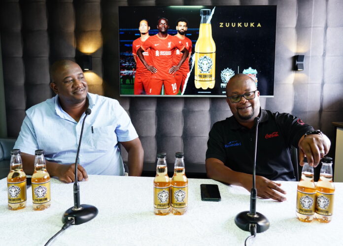 Michael Kimuli, the Monster Energy Business Manager in Uganda and Newton Lee Ogong, Special Events and Promotion Manager, Coca-Cola Beverages Africa during the reveal 2.