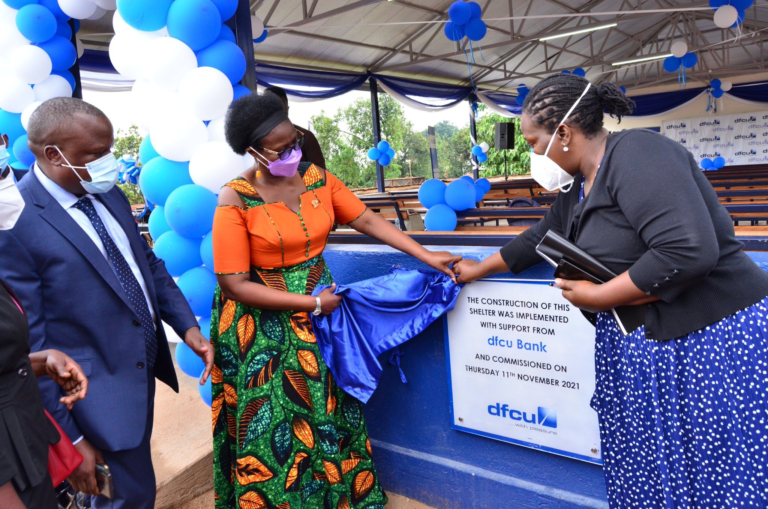 Dfcu hands over 100-seater shelter and refurbished children’s play area to Uganda Cancer Institute