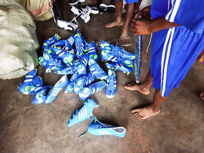 Some of the soccer boots that were brought for the Masaka School for the Deaf soccer team that will be reprensenting Masaka City in the Primary and Special needs School Tournament