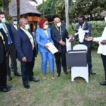 Museveni interacts with MTN MTN Group Chief Jonas Mcebisi, f MTN Uganda Chairman Charles Mbire, MTN Uganda Chief Executive Ms. Sylivia Mulinge.