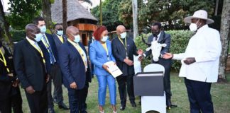 Museveni interacts with MTN MTN Group Chief Jonas Mcebisi, f MTN Uganda Chairman Charles Mbire, MTN Uganda Chief Executive Ms. Sylivia Mulinge.