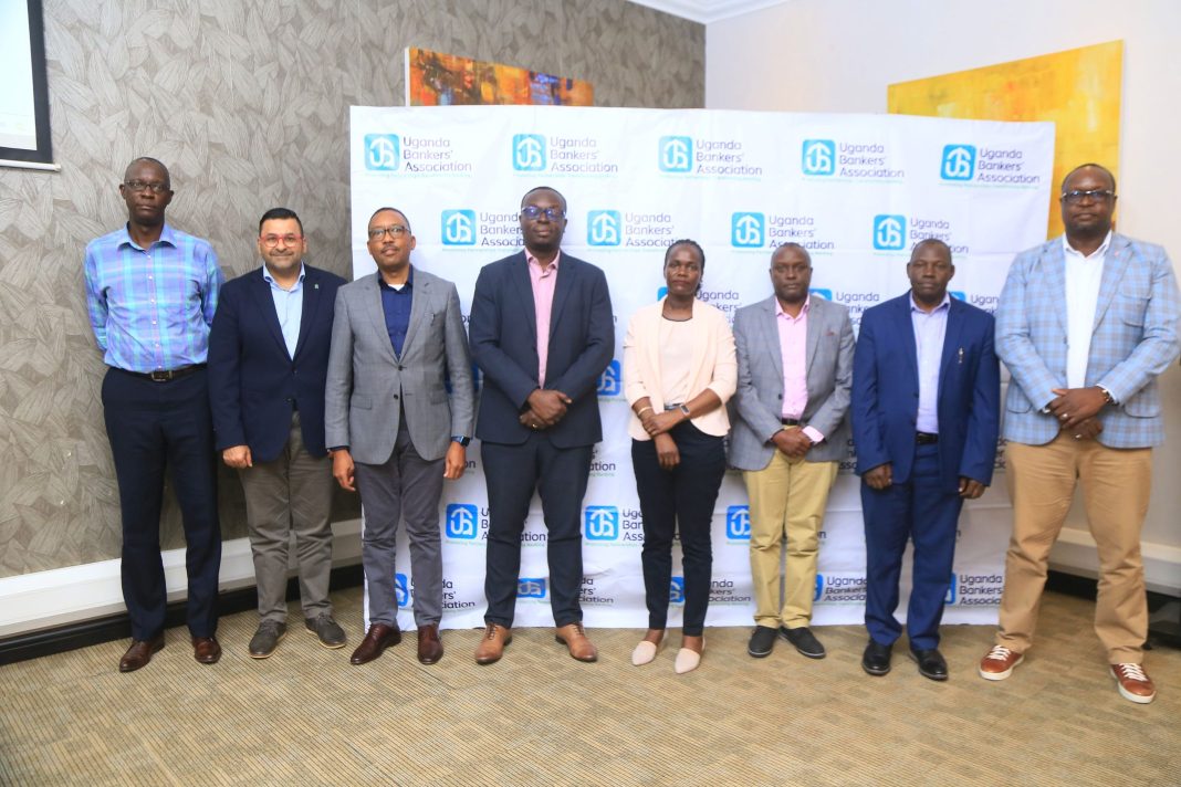 The UBA Executive Committee 2024/2025, L-R, Wilbrod Owor (ED, UBA Secretariat), Sanjay Rughani (CEO, Standard Chartered), Micheal Mugabi (MD/CEO, Housing Finance Bank), Julius Kakeeto (MD, Post Bank), Patricia Ojangole (MD, Uganda Development Bank), Edgar Byamah (MD/CEO, KCB Bank), Shafi Nambobi( CEO, UGAFODE) and Mumba Kalifungwa (MD/CEO, Absa Bank).