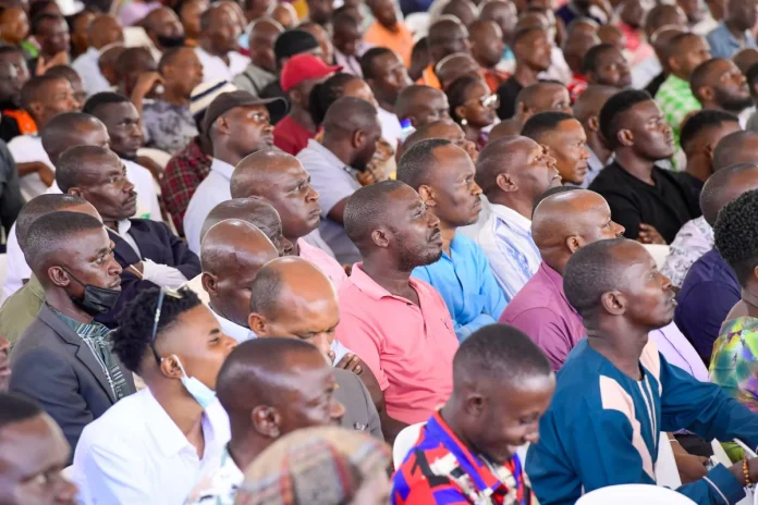 Traders listening to Museveni at Kololo at the past event.