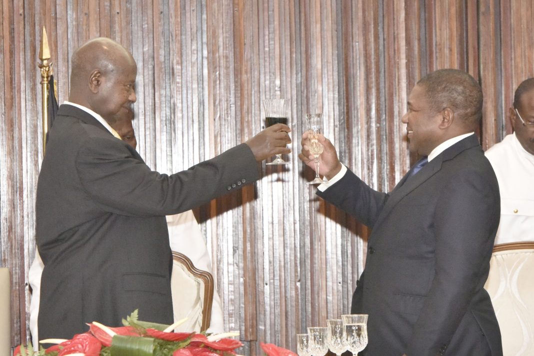 President-Filipe-Jacinto-Nyusi-of-Mozambique-and-President-Museveni-make-a-toast-during-a-state-banquate-at-Vermelha-State-House-in-Maputo-Mozambique-on-Thursday-May-17-2018.-PPU-Photo.jpg