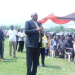 Minister Baryomunsi urges District Health Officers to address critical health logistics challenges at a recent event.